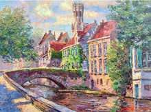 Old tea house with canals of Bruges