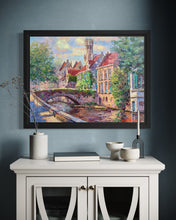 Old tea house with canals of Bruges