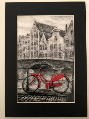 Bridge of Bruges with red bicycle
