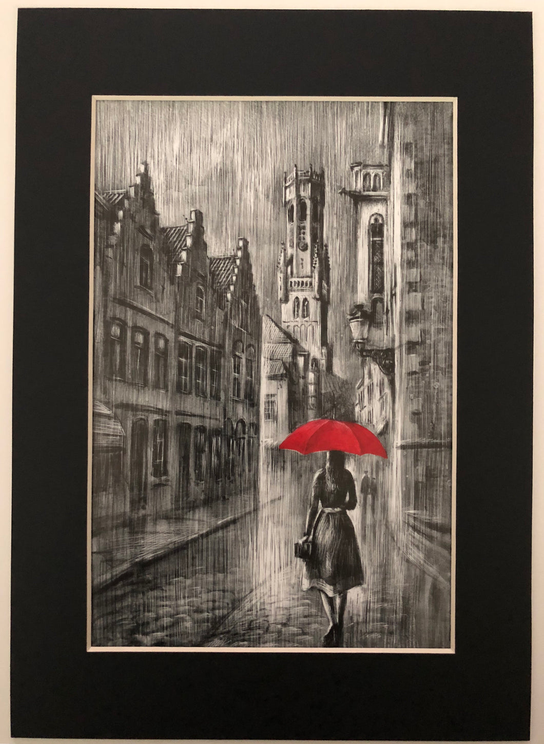 Girl under umbrella in Bruges